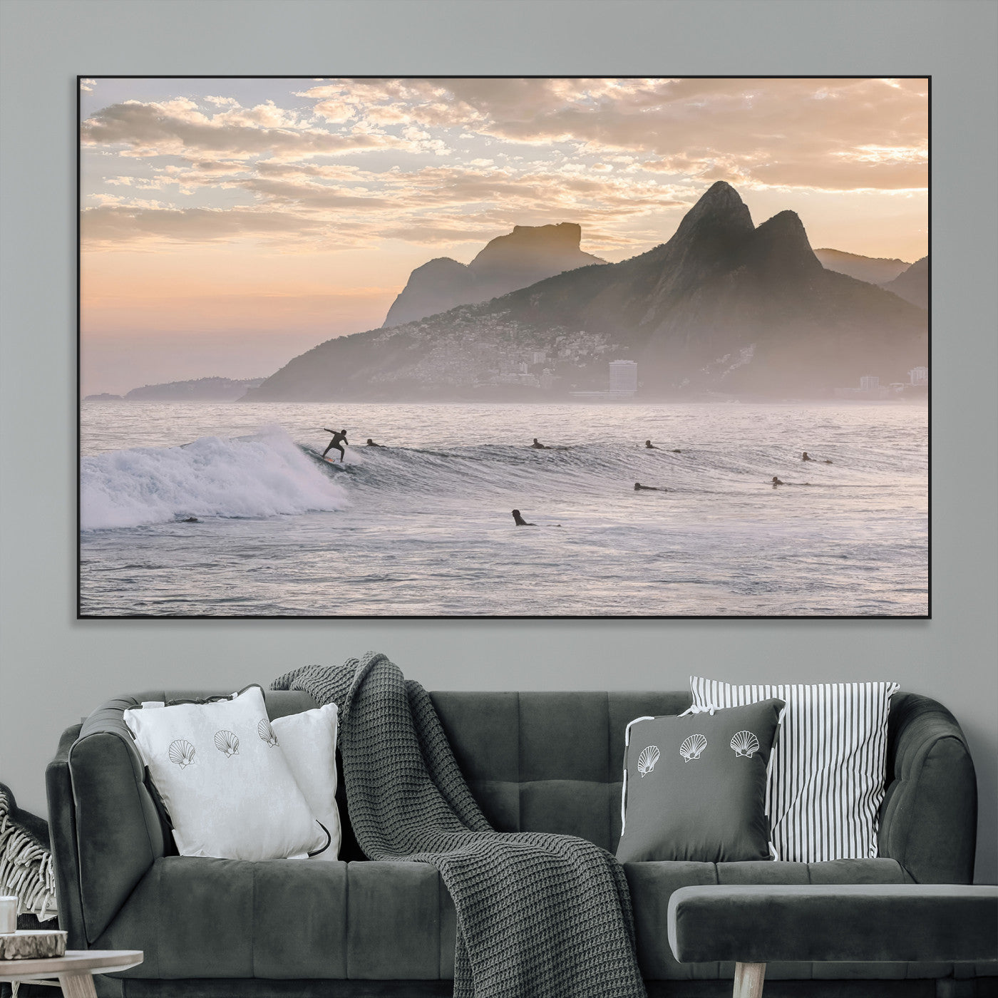 A surfer rides a golden hour wave near misty coastal mountains, surrounded by fellow surfers, capturing the spirit of a coastal adventure.