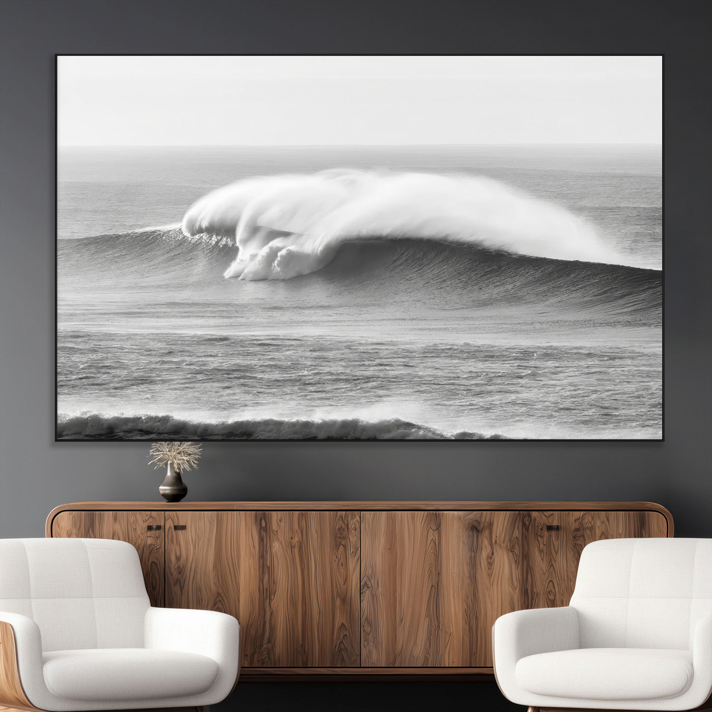 A dramatic black and white ocean wave crashing with immense force, capturing the raw power and movement of the sea in a bold seascape.