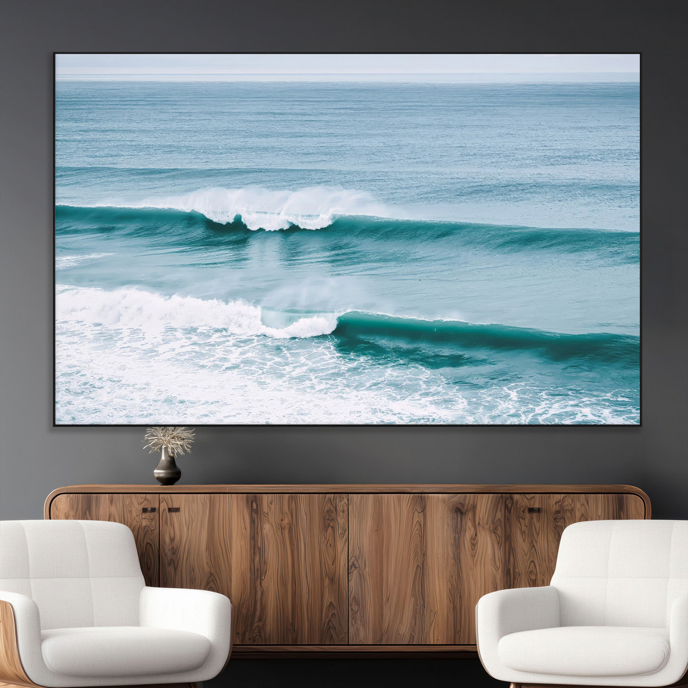Powerful ocean waves rolling towards the shore, their turquoise hues blending with white sea foam under an open horizon, capturing the essence of the ocean's movement.