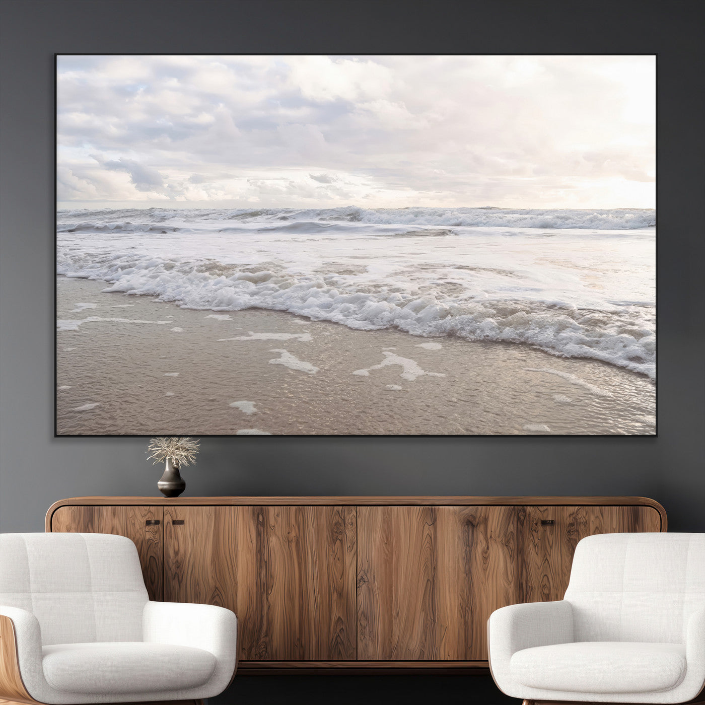Peaceful ocean waves rolling onto the sandy shore under soft light, perfect for neutral or coastal minimalist decor themes.