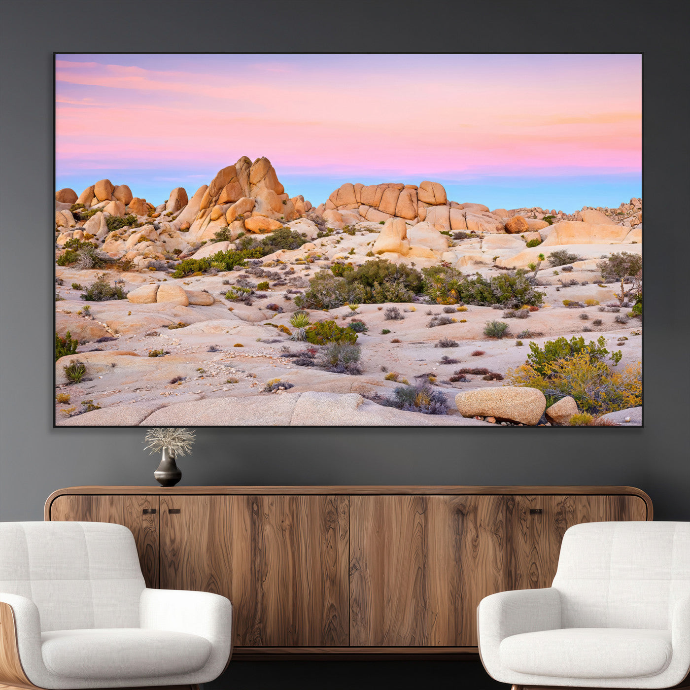 A breathtaking desert landscape featuring rugged rock formations under a vibrant pastel sunset sky, capturing the warmth and serenity of a Southwestern wilderness.