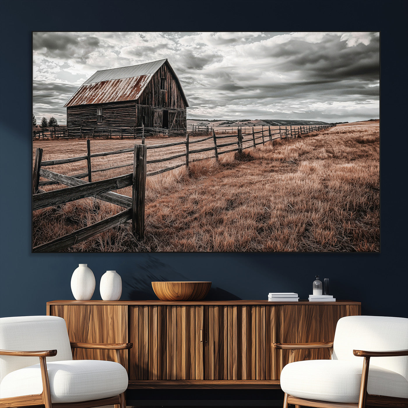 Framed canvas of a rustic barn under a moody sky with weathered fence and dark fields, ideal for farmhouse or rural-style wall decor.