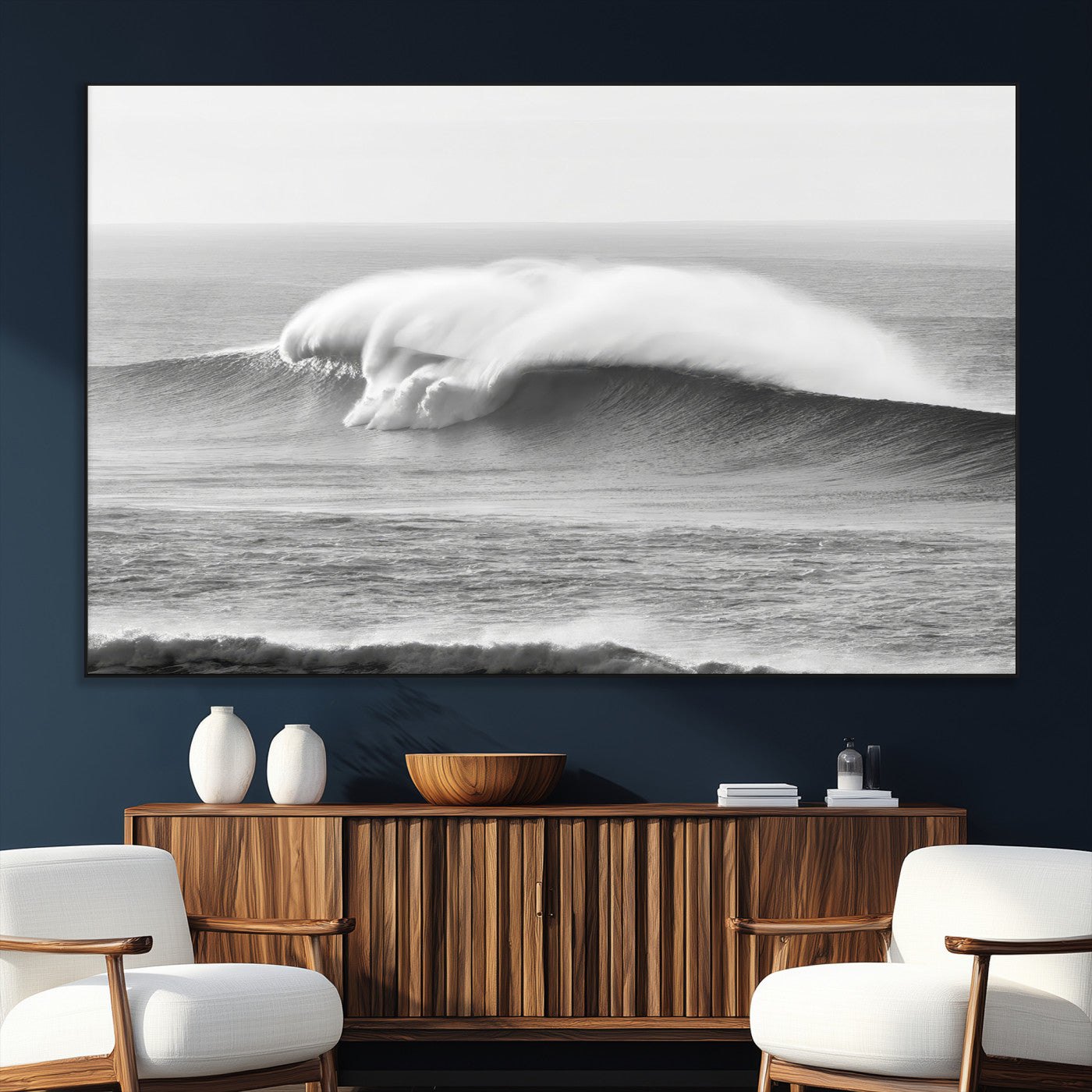 A dramatic black and white ocean wave crashing with immense force, capturing the raw power and movement of the sea in a bold seascape.