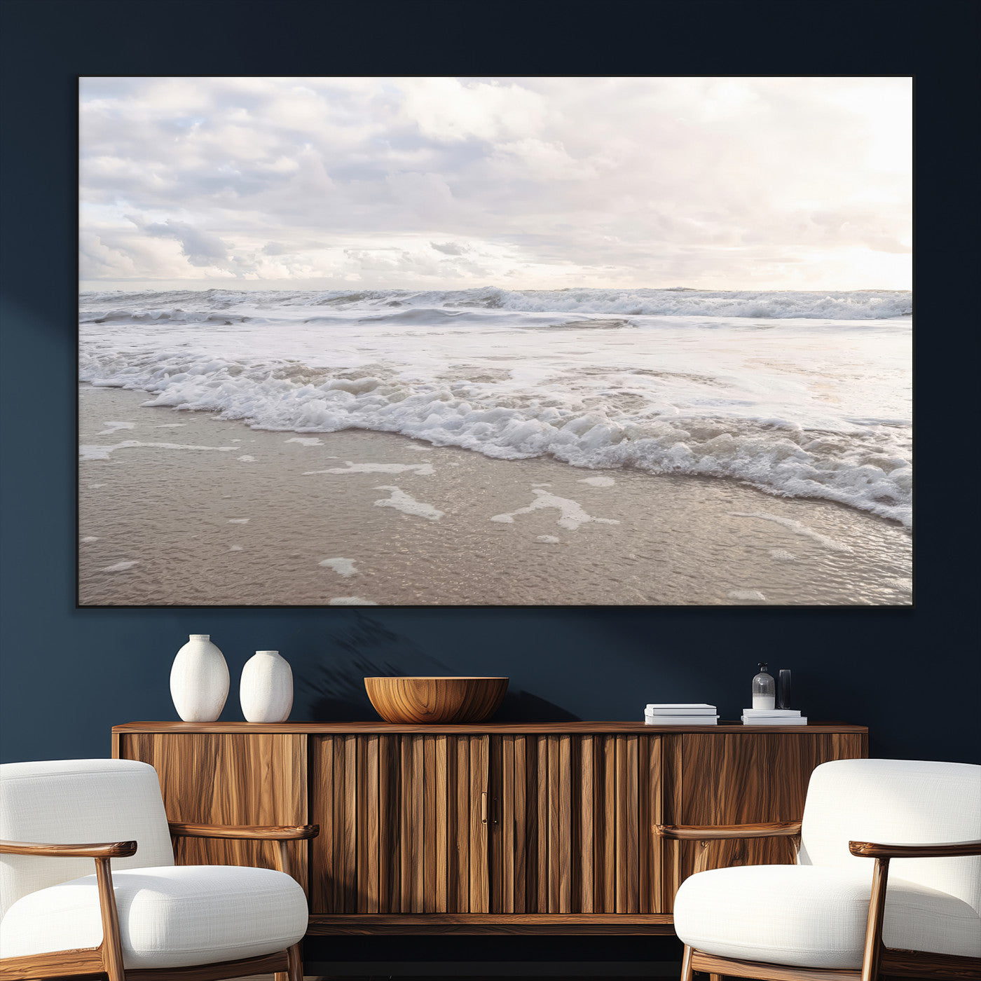 Peaceful ocean waves rolling onto the sandy shore under soft light, perfect for neutral or coastal minimalist decor themes.