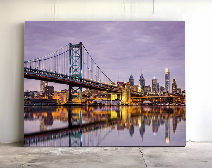 A woman holds the Philadelphia Ben Franklin Bridge Wall Art Canvas Print, a gallery-quality photo showcasing a city skyline with the bridge reflecting on the river. This stunning piece would make an excellent addition as premium canvas wall art for any home.