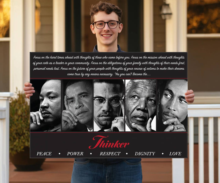 The wall art is a black and white piece featuring iconic figures accompanied by the words Thinker Peace Power Respect Dignity.