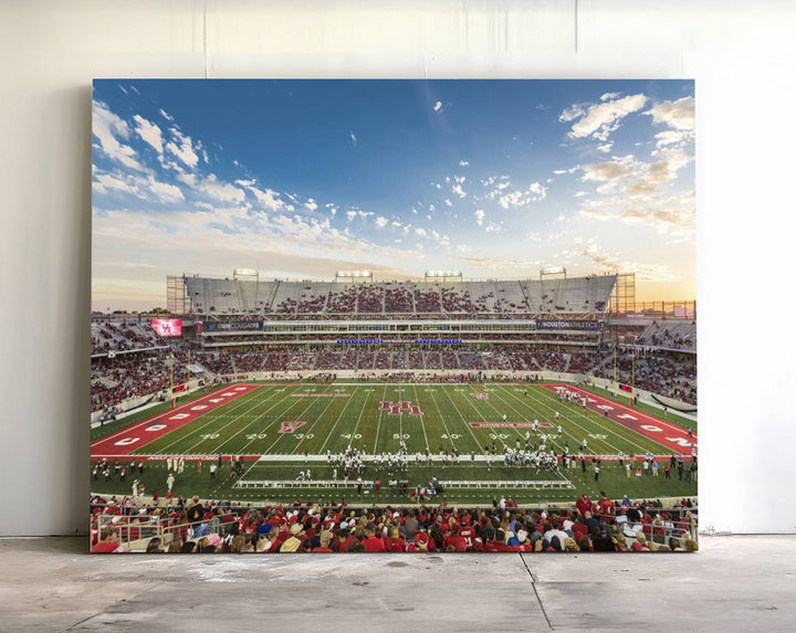 A Houston Cougars print of TDECU Stadium with a game crowd beautifully enhances the living room decor.