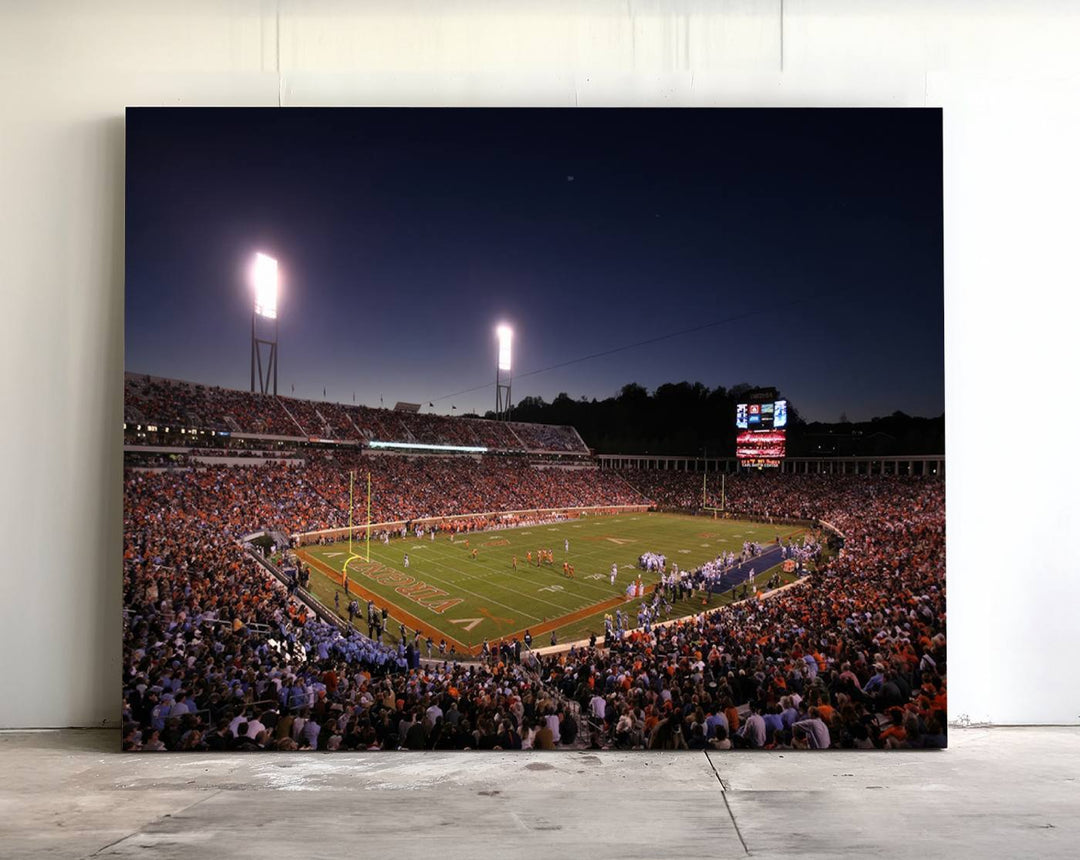 A nighttime game at Scott Stadium, floodlit—a scene from the Virginia Cavaliers Football art print.