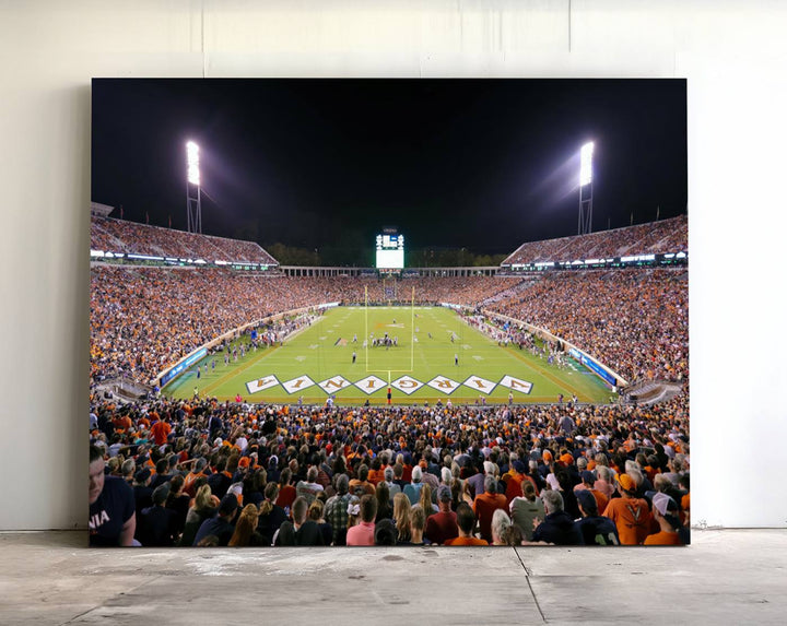 A Virginia Cavaliers Wall Art Canvas Print captures Scott Stadium filled with fans under the night sky.