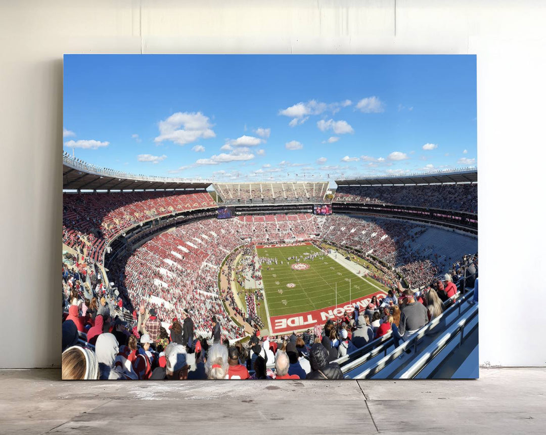 Canvas print of Alabama Crimson Tides Bryant-Denny Stadium, showcasing a sunlit field under a blue sky.