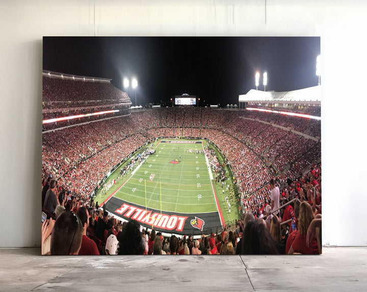 Panoramic view of a crowded football stadium with Louisville in the end zone, crafted as University of Louisville wall art.