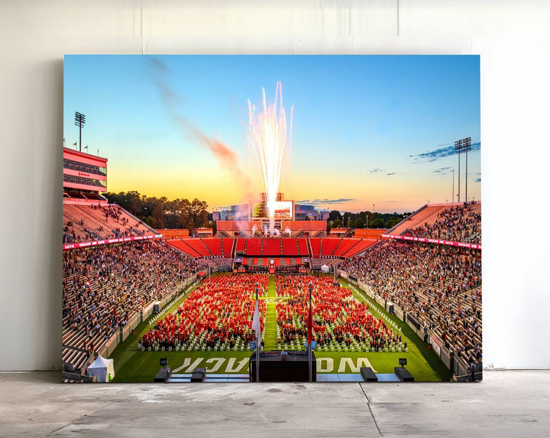 A vibrant North Carolina State University Wolfpack print, capturing a people-filled stadium, fireworks, and a sunset—perfect for your living room wall.