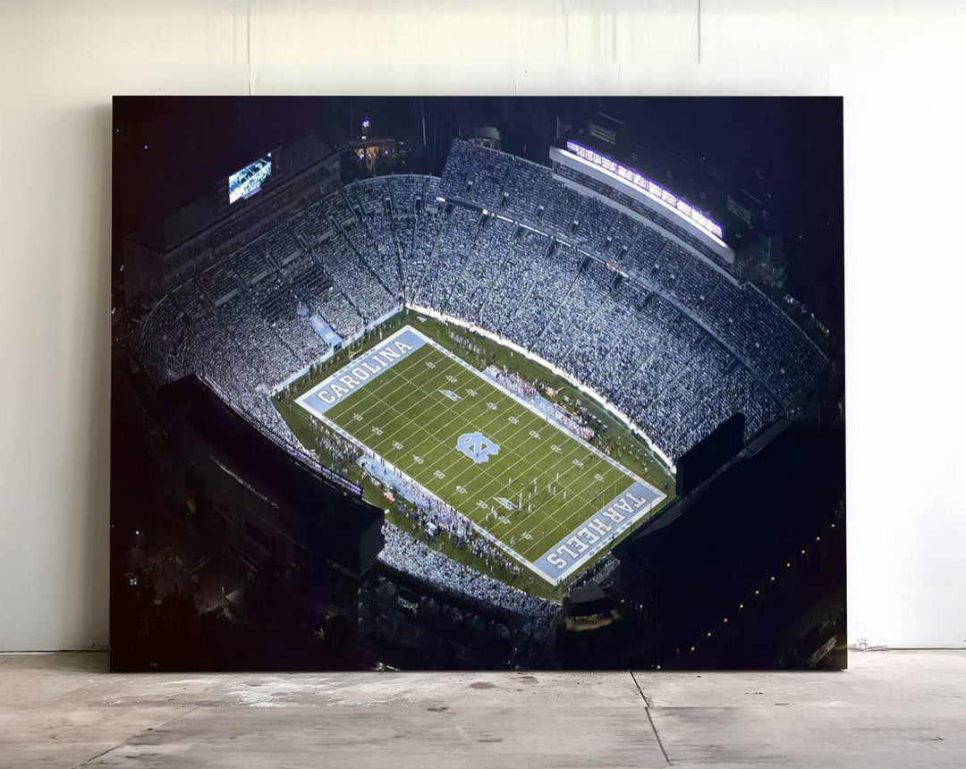 Aerial view of UNC Tar Heels night game at Kenan Memorial Stadium, perfect wall art canvas for fans.