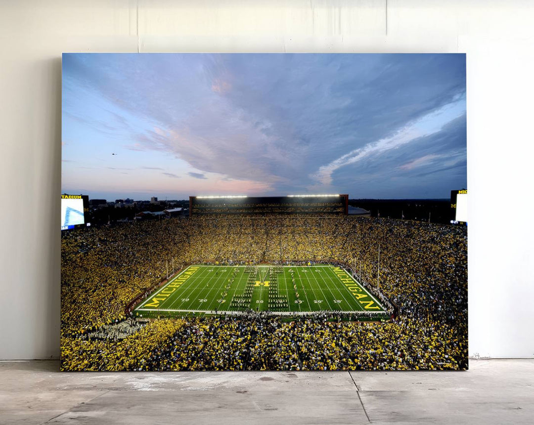 Gallery-quality canvas print of Michigan Stadium at sunset.