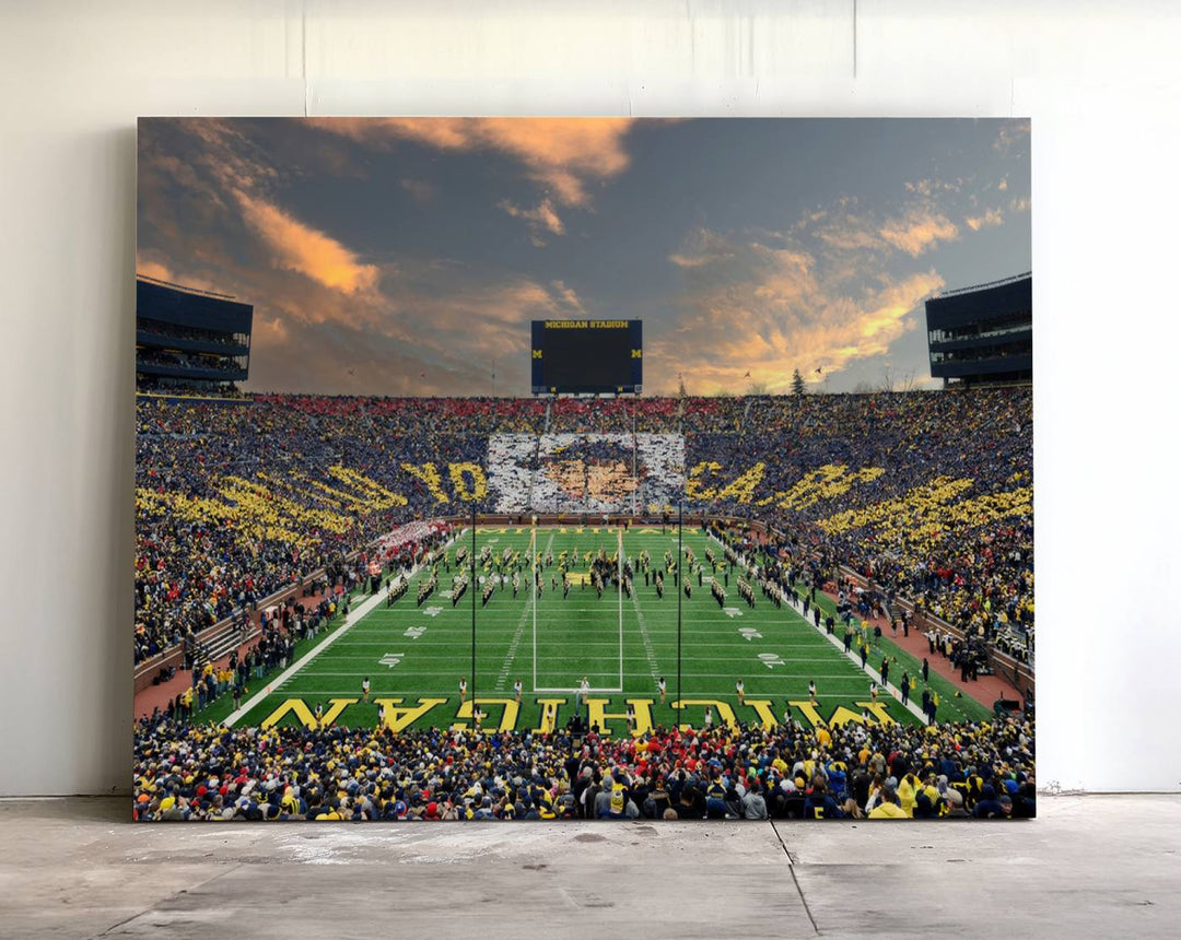 A giant image resembling Michigan Wolverines Wall Art depicts a football field beneath a dramatic sky.