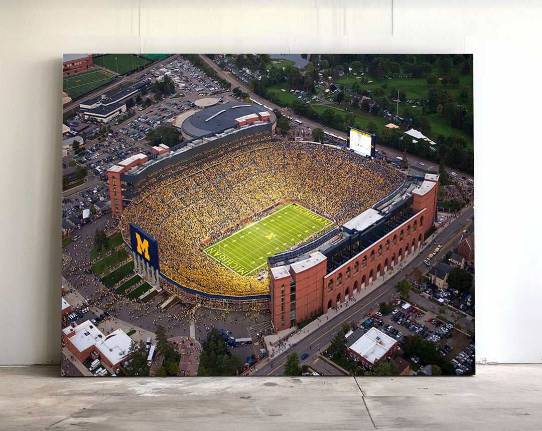 Canvas print featuring an aerial view of Ann Arbor Michigan Stadium filled with Wolverines fans.