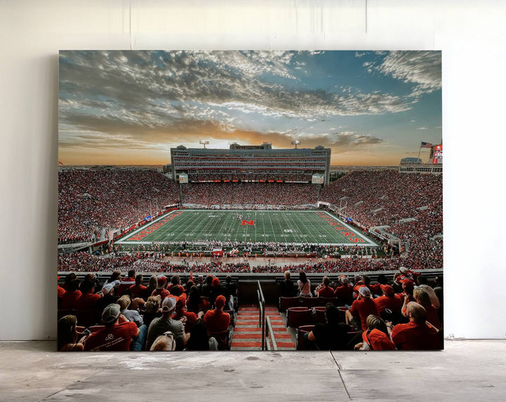 This stunning canvas wall art print features a packed Lincoln Memorial Stadium with the University of Nebraska Cornhuskers at sunset.