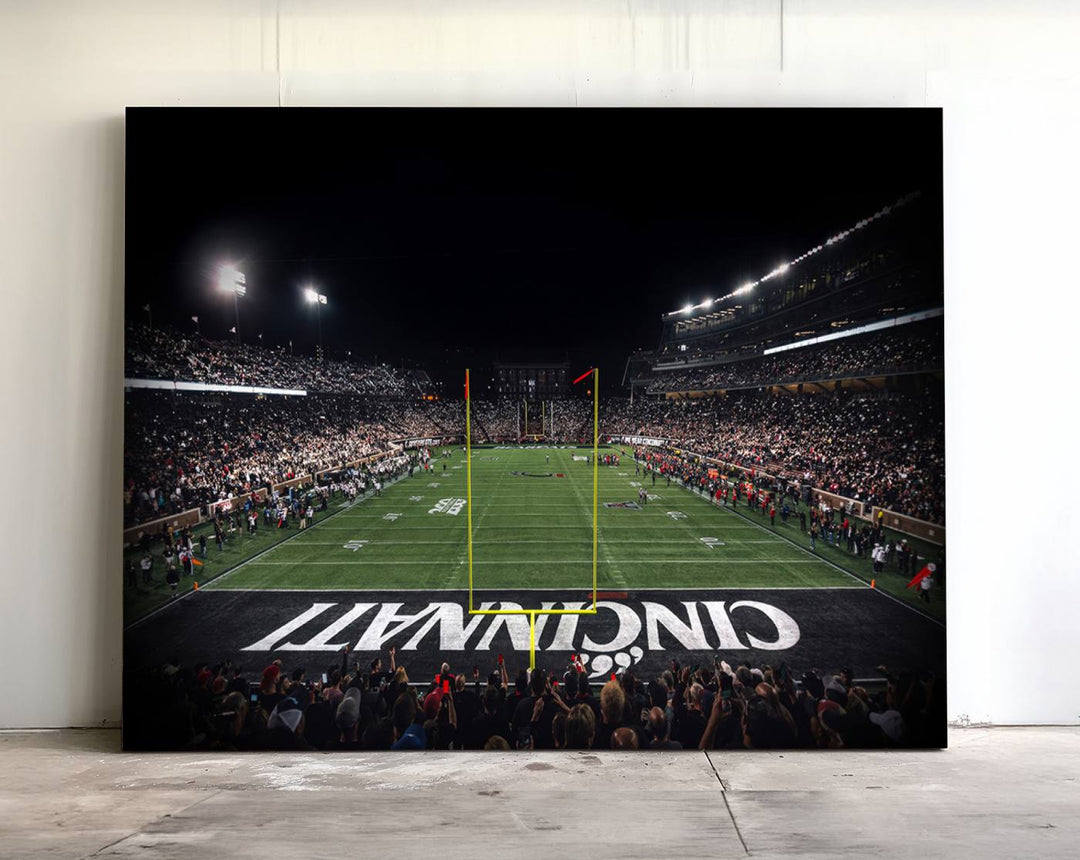 Interior view featuring a Cincinnati Bearcats football canvas of Nippert Stadium.