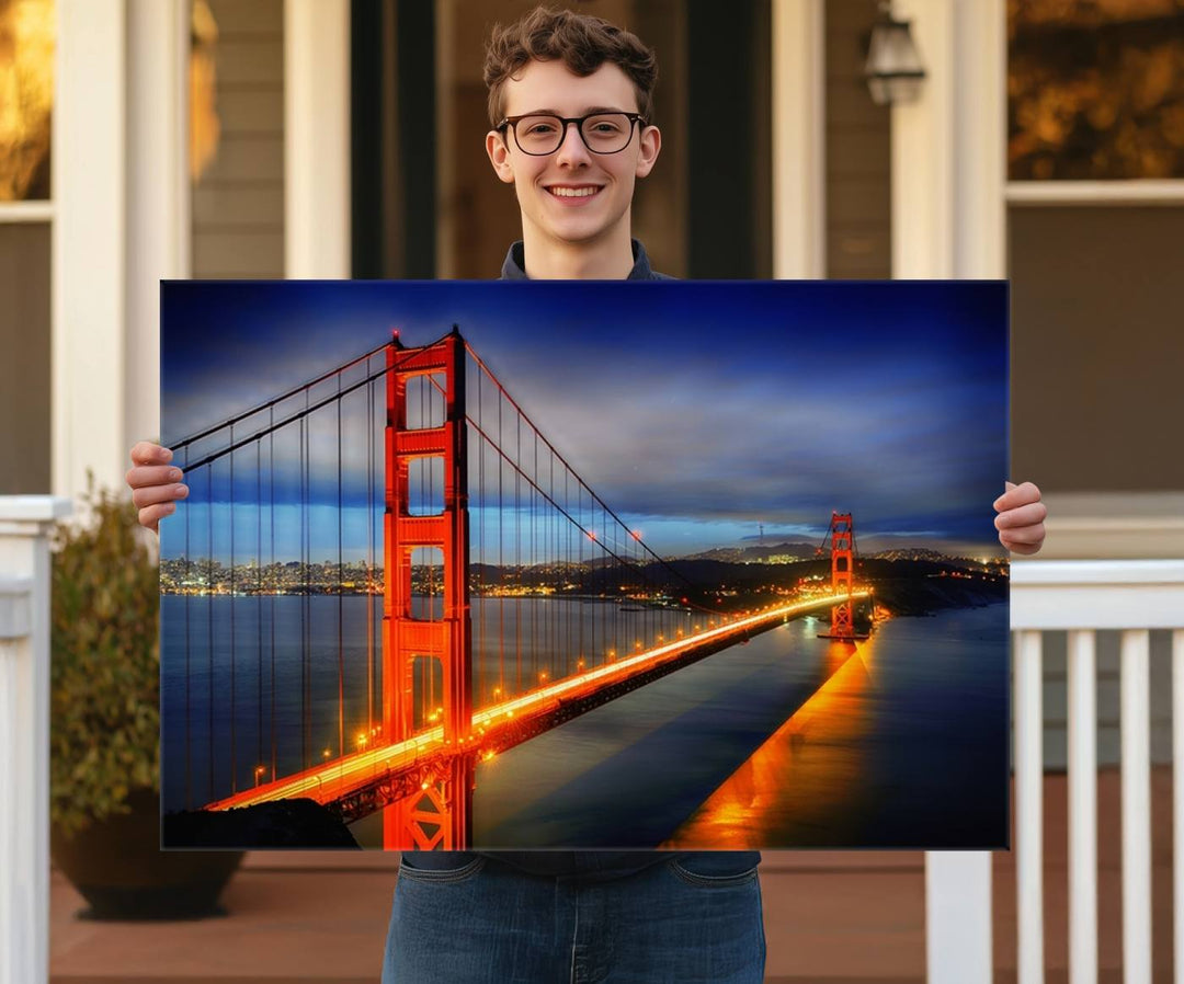 A large wall art San Francisco canvas print of the Golden Gate Bridge at twilight is displayed on a porch.