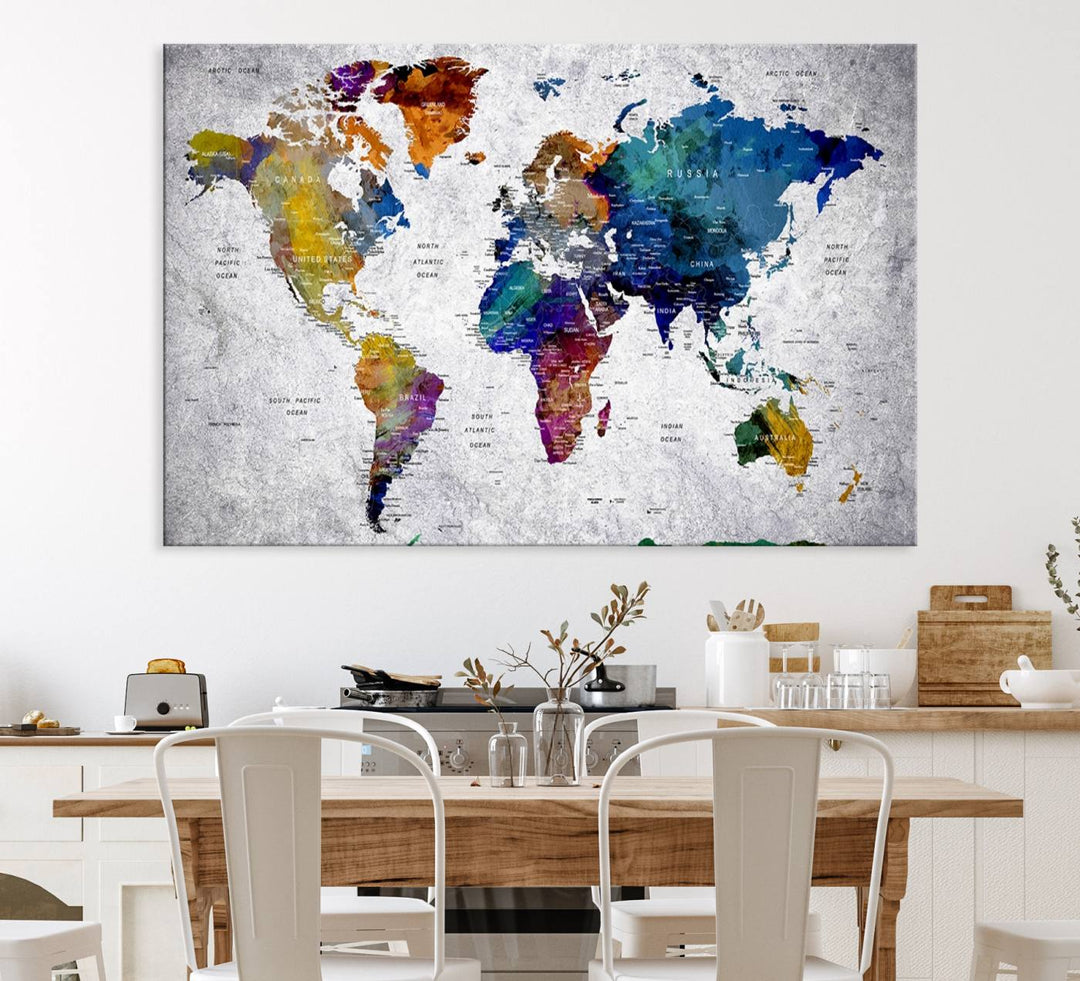 The World Map Art Canvas Print, featuring country names on a grunge-stained gray background, is perfect for stylish home decor.