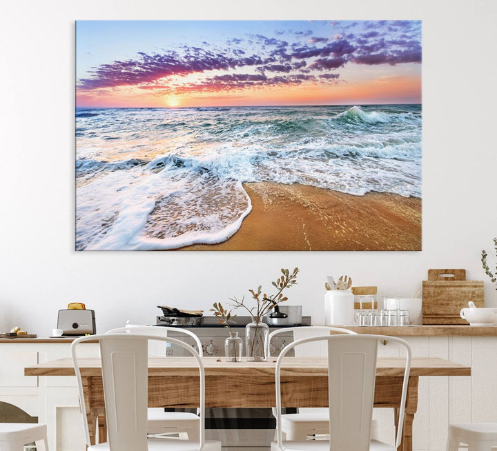 The Tropical Beach Waves Art Print, depicting an ocean sunset and sandy shore, enriches the coastal decor of the dining area.