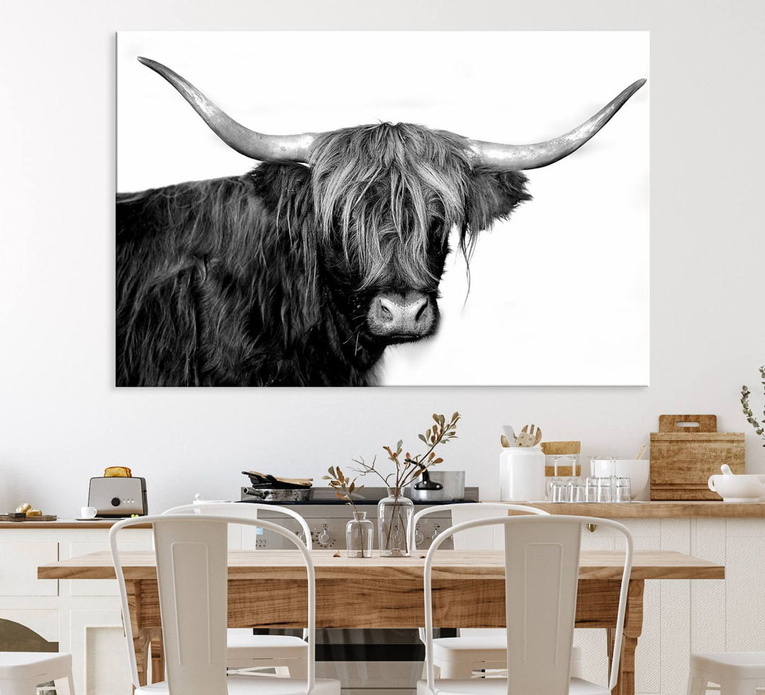 The Black and White Highland Cow Multi Panel Wall Art Canvas Print with UV-protection hangs prominently.