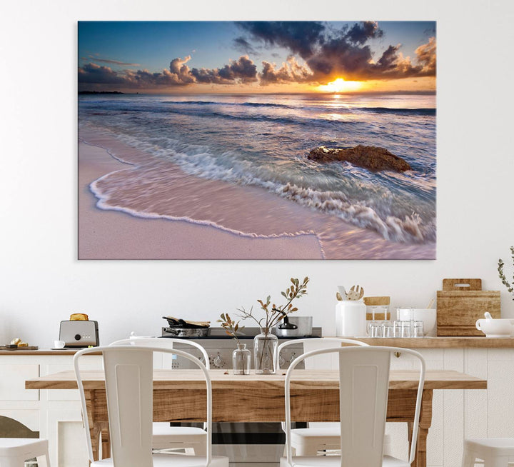 The room features a Sunset Beach Waves Canvas above the counter.