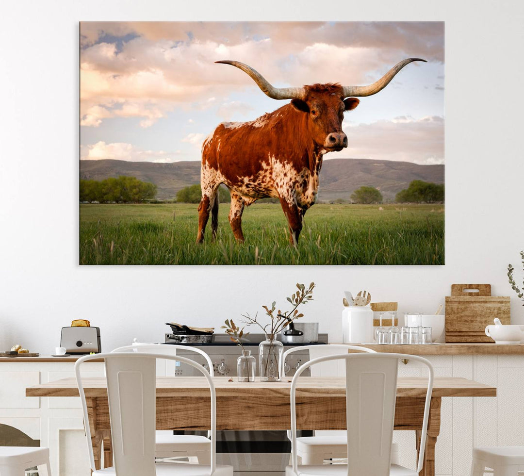 The Texas Cow Canvas Wall Art print captures a longhorn cow at sunset and is ready to hang.