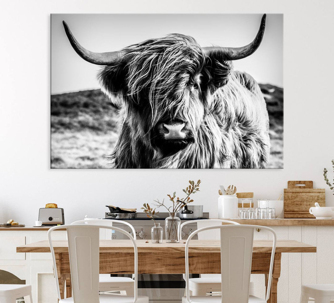 A Black and White Scottish Cow Canvas Print adorns the kitchen wall, perfect for farmhouse decor.