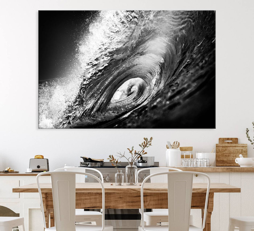 The Black Ocean Wave at Sunset Canvas Art hangs on a grey wooden wall.