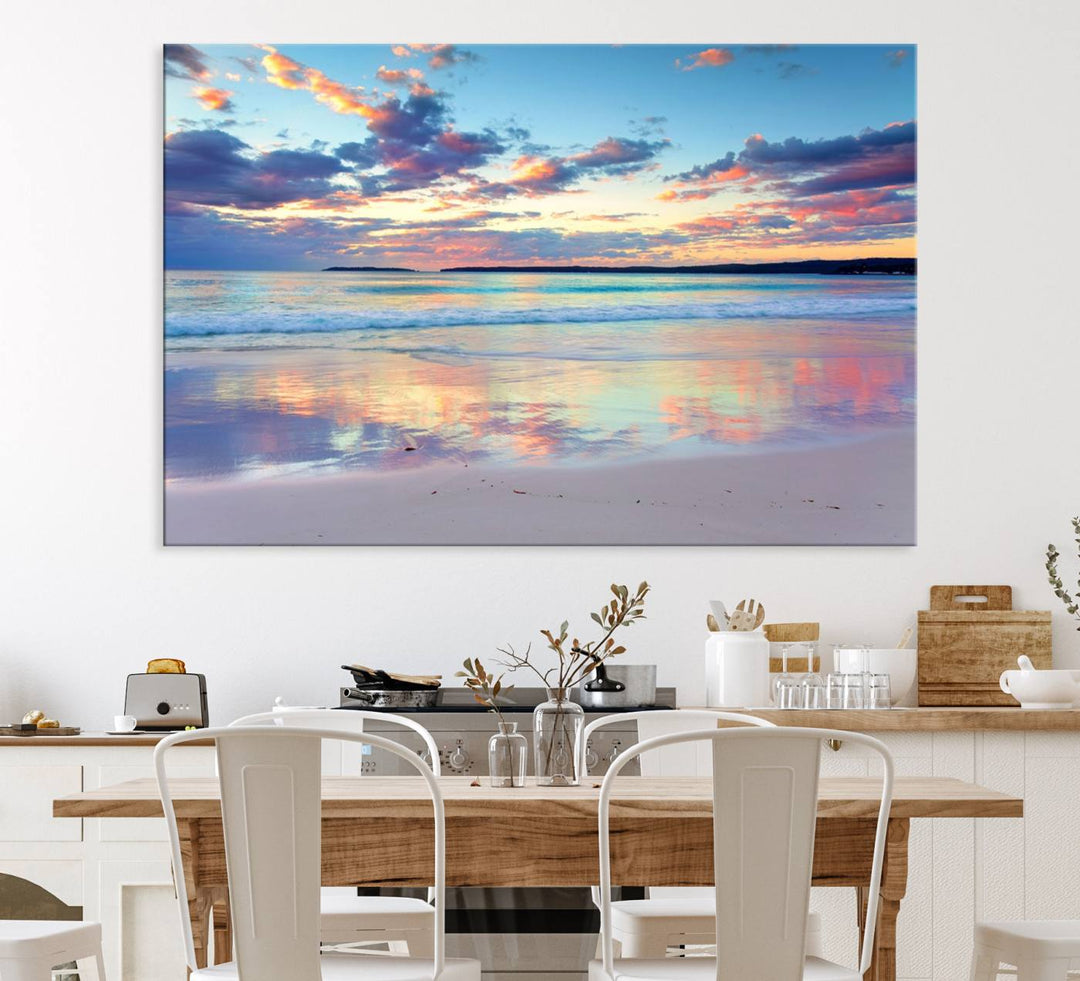 The Tranquil Pastel Sunset Beach Triptych Canvas Art hangs, showcasing its serene beauty.