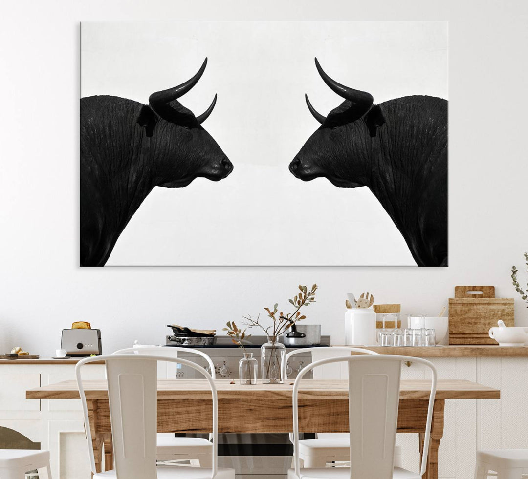 Spanish Bull Wall Art Canvas Print: Two black bull heads facing off on museum-quality canvas.