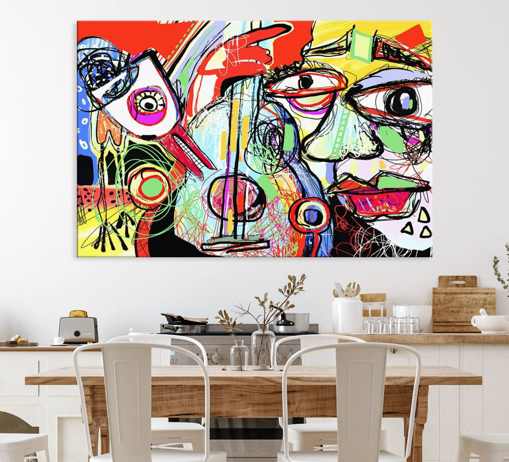 A Picasso-style abstract canvas with vibrant colors and a distorted face enhances the space.