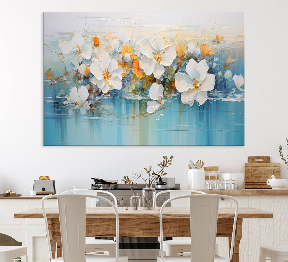 An Abstract Flower Wall Art Canvas Print in blue and orange hues.