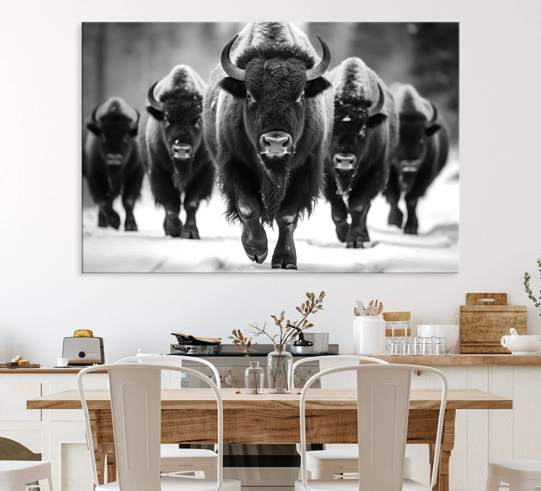 A black and white American Bison herd canvas print adorns the wall.