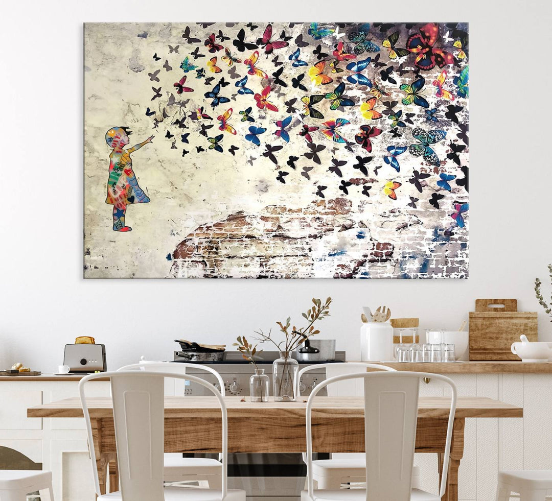 A Banksy Girl Butterfly Canvas Print is displayed on the textured wall.