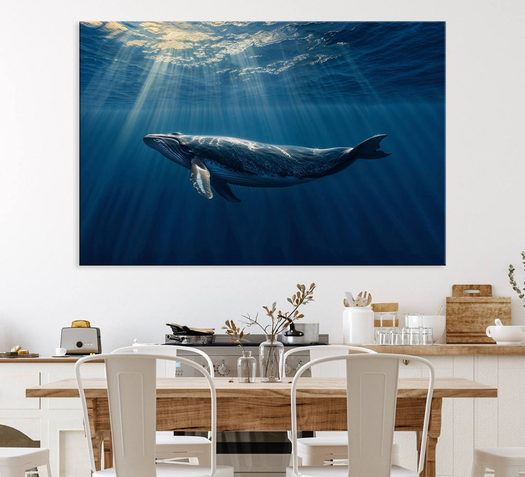 The Whale under Ocean wall art canvas print graces the white wall.