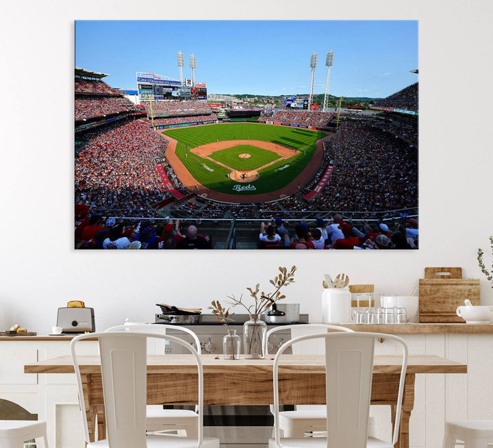 The Cincinnati Reds Baseball Team print of Great American Ball Park Stadium adorns the wall.