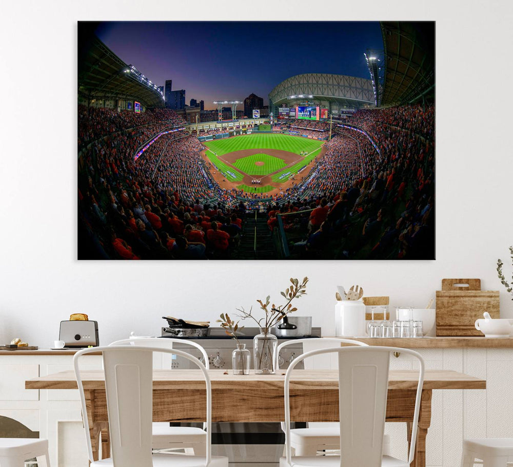 A canvas print of Houston Minute Maid Park at dusk is mounted on the wall.