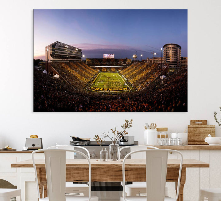 The Iowa Hawkeyes Kinnick Stadium Wall Art Canvas Print captures a sunset scene, making it perfect for display on a wall.