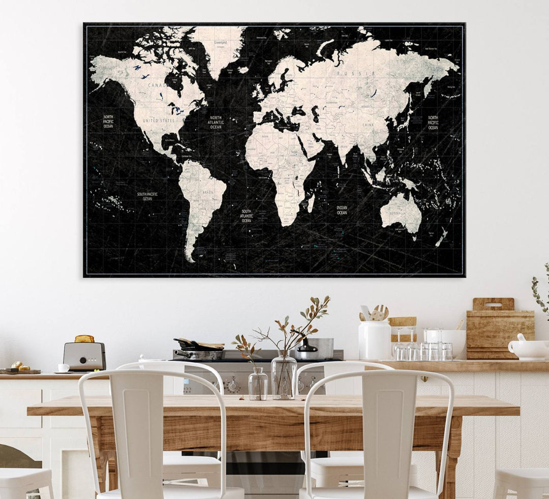 The Black & White World Map Canvas Wall Art, a giclee print, elegantly decorates the wall.