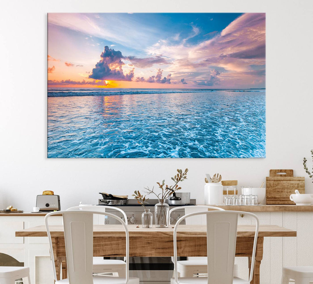 An Ocean Sunset Canvas Wall Art depicting a vibrant sky and rolling waves.