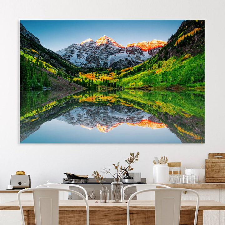 The Sunrise Maroon Bells Lake Wall Art Print beautifully captures North Maroon Peak mirrored in the tranquil lake, framed by lush greenery.