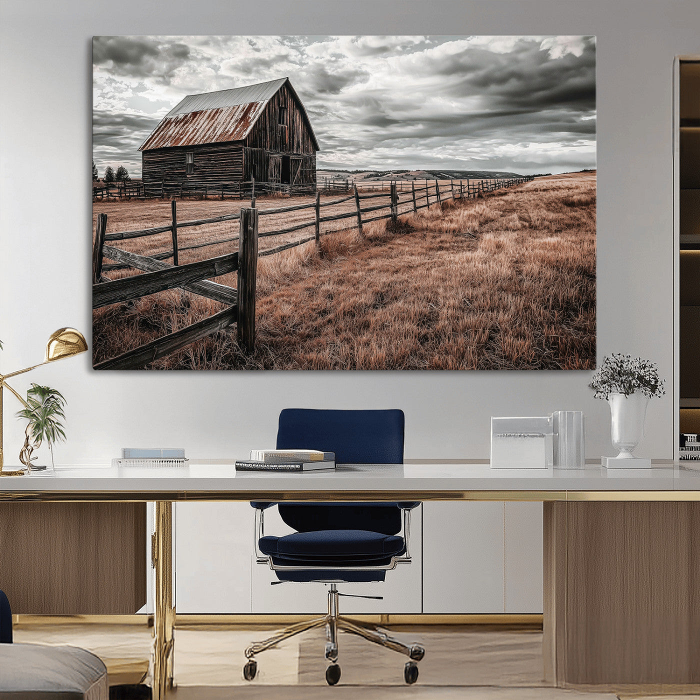 Framed canvas of a rustic barn under a moody sky with weathered fence and dark fields, ideal for farmhouse or rural-style wall decor.