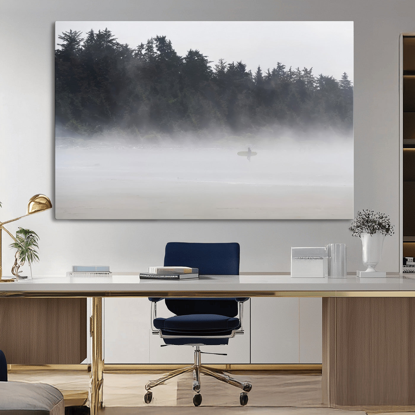 A lone surfer carrying a board through a misty shoreline, surrounded by dense trees and fog, creating a peaceful and mysterious coastal scene.