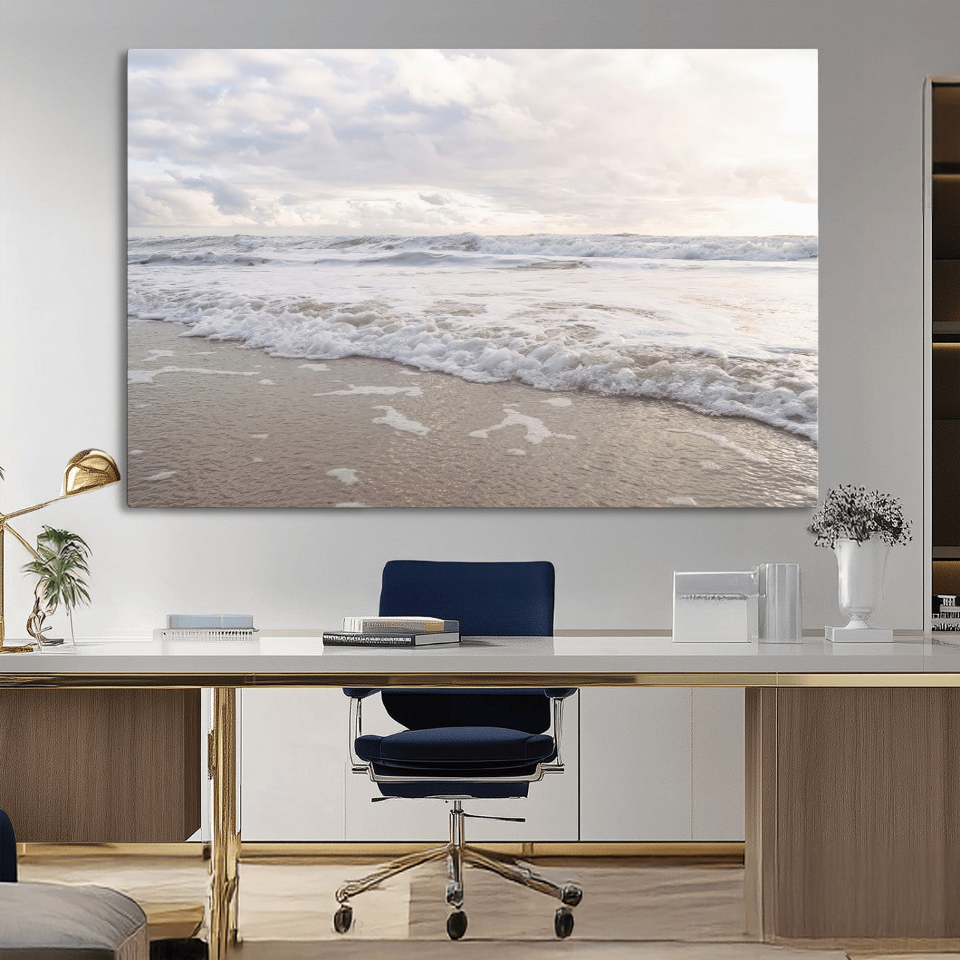 Peaceful ocean waves rolling onto the sandy shore under soft light, perfect for neutral or coastal minimalist decor themes.