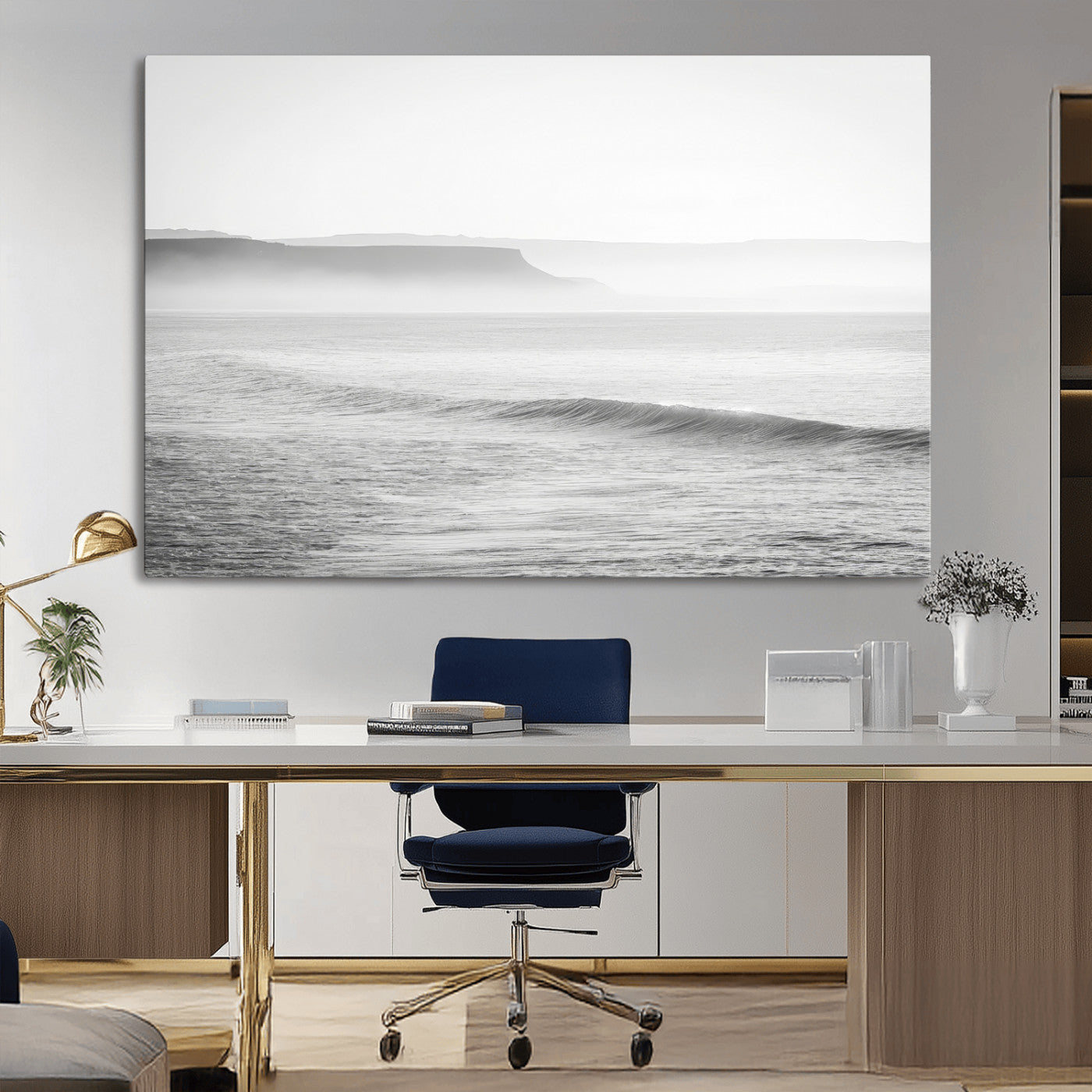 A black and white minimalist seascape featuring soft rolling waves and misty distant cliffs, creating a serene and timeless coastal atmosphere.
