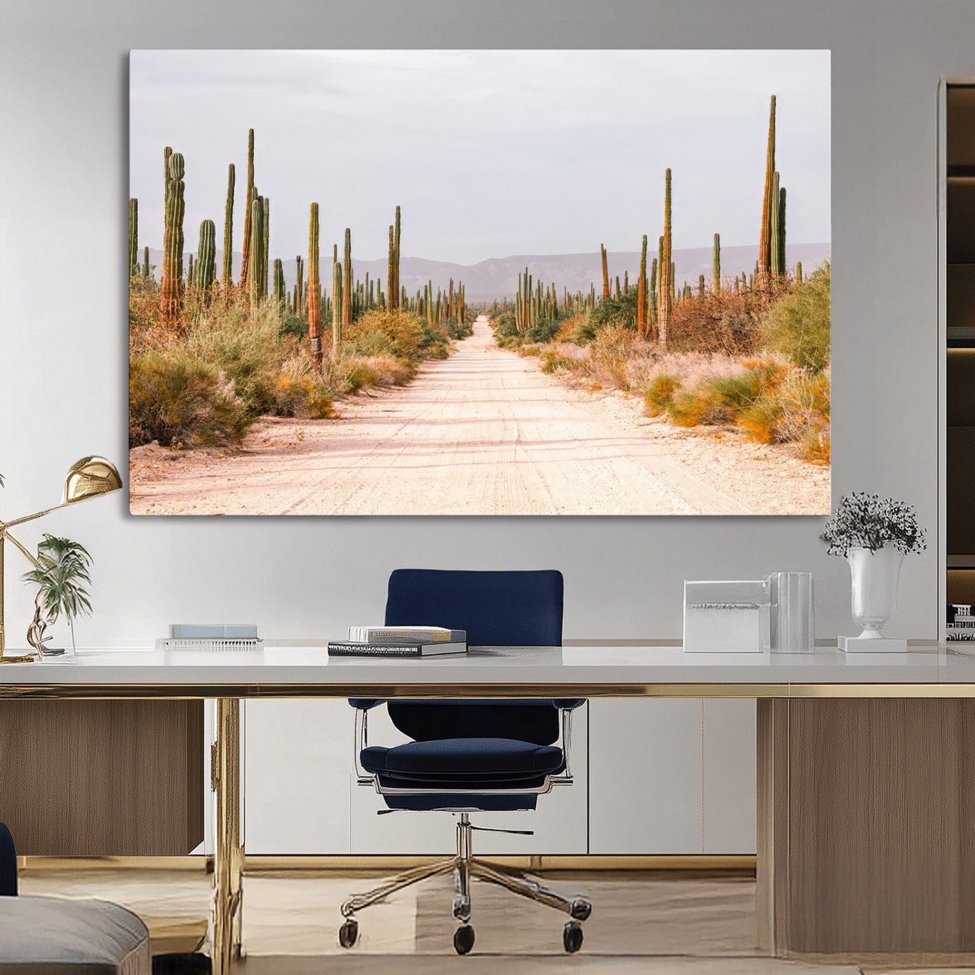 A desert road lined with saguaro cacti under a golden sky, creating a warm southwestern feel, perfect for boho or rustic decor.
