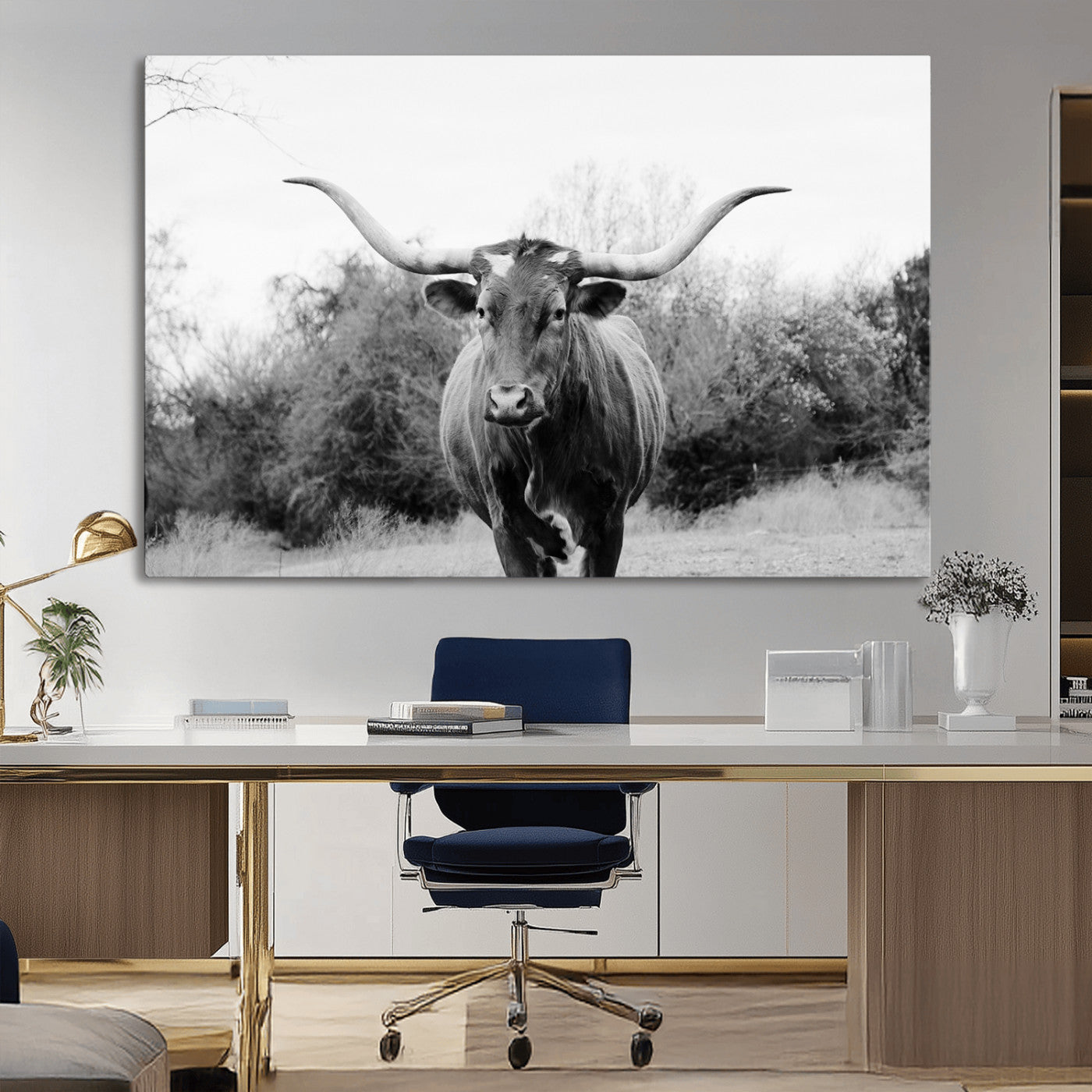 Black and white photo of a Longhorn cow facing camera, ideal for rustic, farmhouse, or western-themed home wall decor.