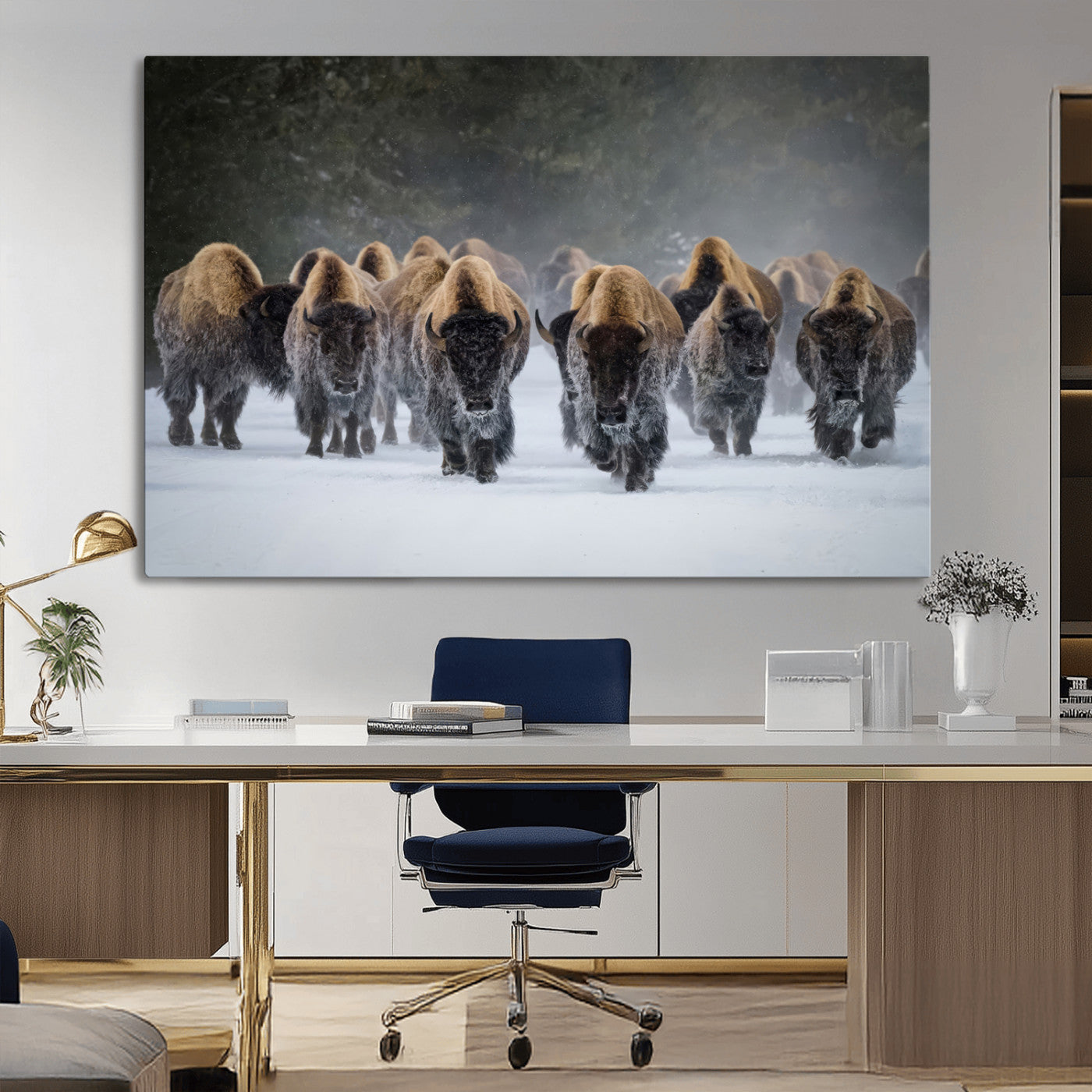 A herd of American bisons walking through deep snow in a forest, evoking a powerful rustic wilderness mood for western-style interiors.